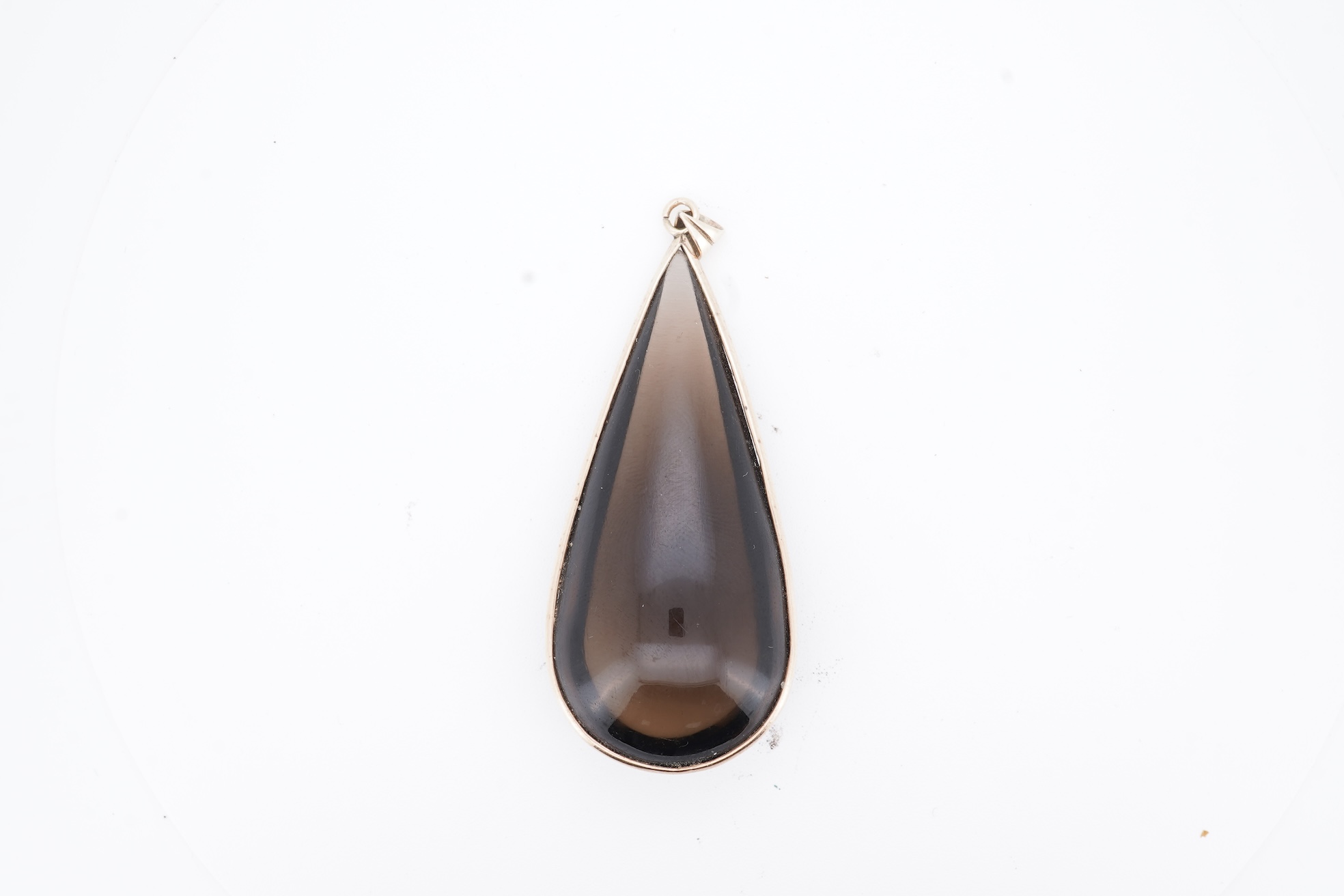 A yellow metal mounted pear shaped smoky quartz set drop pendant, overall 59mm.